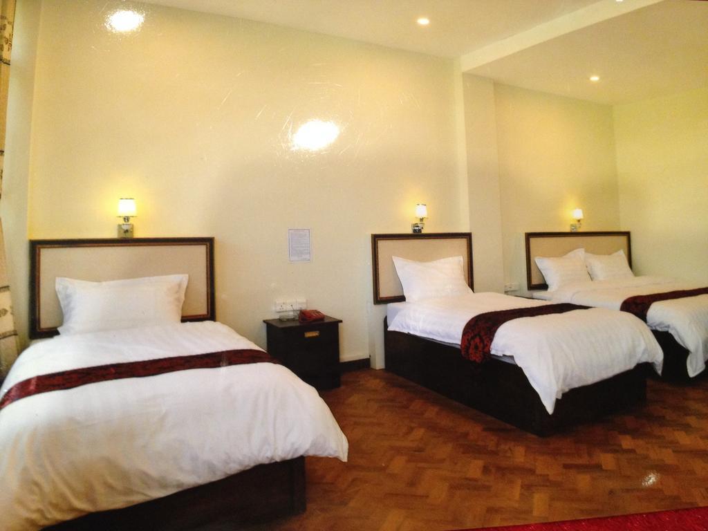 Hotel Myitkyinā Quarto foto